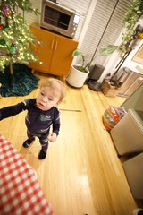 Toddler in Christmas Pajamas at Home