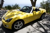 Sleek Yellow Sports Car on the Roadside
