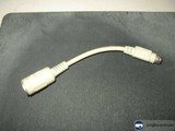 White Cord Connected to Computer