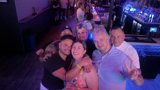 Vibrant Nights: A Joyful Gathering at the Bar