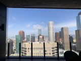 Cityscape View from High-Rise Window