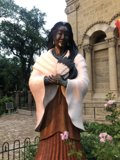 Woman with a Rosary Statue at the Monastery