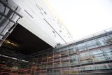 Urban Office Building with a Striking Glass Wall
