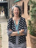 Smiling Lady with Polka Dot Blouse