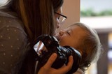 Tender Christmas Moment Between Mother and Child