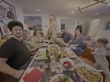 Family Thanksgiving Dinner Gathering Around Table