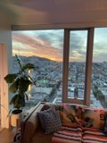 Cozy Living Room with a Breathtaking Urban View