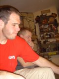Red Shirt Man in Living Room