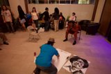 Interactive Artistry: Floor Sketching in Action