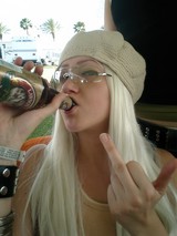 Woman with White Hair Enjoying a Cold Beer at Coachella