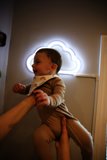 A Bundle of Joy Held High