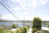 Power Line Overlooking a Tranquil Lake