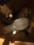 Bottle in a Brown Bag on the Couch