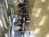 Tech Meetup Group Celebration in Modern Office Space