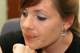 Pensive Woman in Contemplative Close-Up Portrait