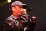 Entertainer Rocks Coachella Stage with Baseball Cap on