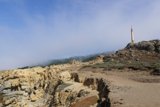 The Majestic Lighthouse on a Rocky Cliff
