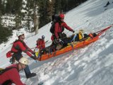 Sledding Fun in the Snowy Slopes