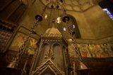Glowing Ornate Chandelier in Church Crypt