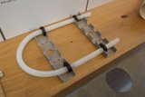 Plywood Pipe with Black Attachments