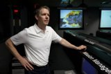 Man in front of Computer Screen