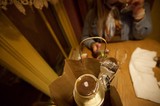 Takeout Dinner and Teapot on Restaurant Table