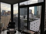 A Swivel Chair by the Cityscape