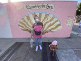 Woman and Dog by a Mural