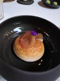 Decadent Flan in a Black Bowl