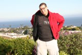 Red Jacket by the Ocean