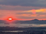 Sunset Over San Francisco Bay with Cargo Ships
