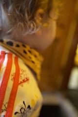 Child Playing Traditional Chinese Musical Instrument Close-Up