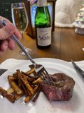 A Person Enjoying Texture-rich Meaty Delight