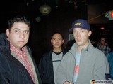 Man in Black Jacket Photobombed by Friends
