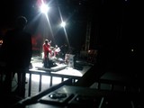 Spotlight on the Red-Shirted Guitarist
