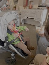 Baby's Feeding Time in Cozy Kitchen