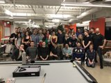 Group Shot in a Billiard Room
