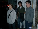 Three Young Men in a Dark Room