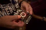 Electronic Device in Hand