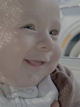 Innocent Baby Portrait with Bright Blue Eyes