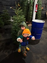 Children Exploring a Christmas Tree Farm