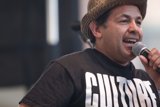 The Entertainer with a Hat and a Mic