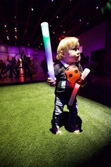 Young Child at Baby Rave Light-Up Event
