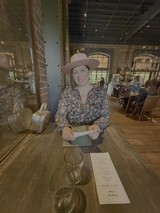 Woman Dining at Rustic Industrial Restaurant