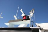 Red Light Boat in the Blue Sky
