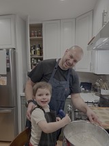 Father and Son Cooking Together in Kitchen