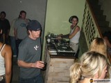 DJ Drops Beats with Stylish Entertainer by His Side