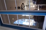 Blue Framed Windows Into Elegant Interior Space