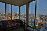Cityscape from a High Rise Penthouse Window