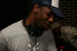 Man Chilling with His Favorite Cap and Headphones